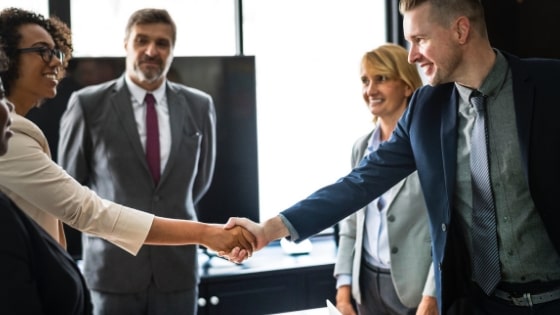 two people shaking hands