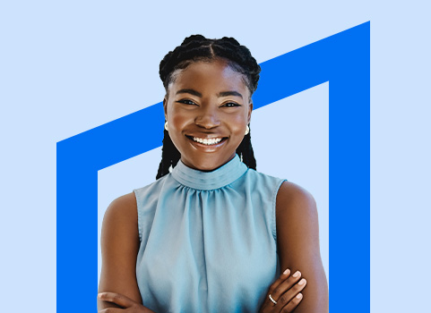 Young professional woman smiling with her arms crossed